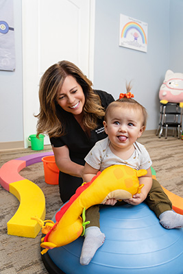 Chiropractor Rocklin CA Marianne Abate With Infant